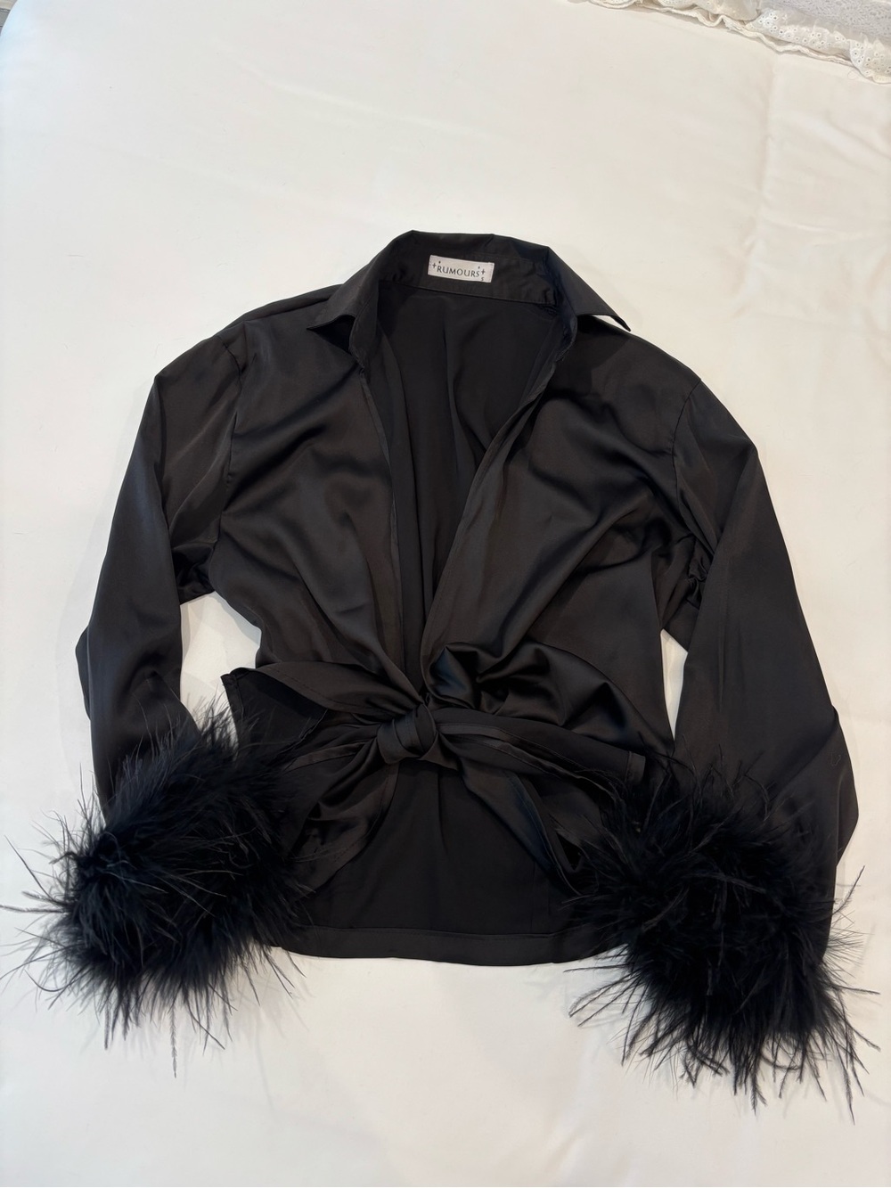 black satin blouse with feather cuffs